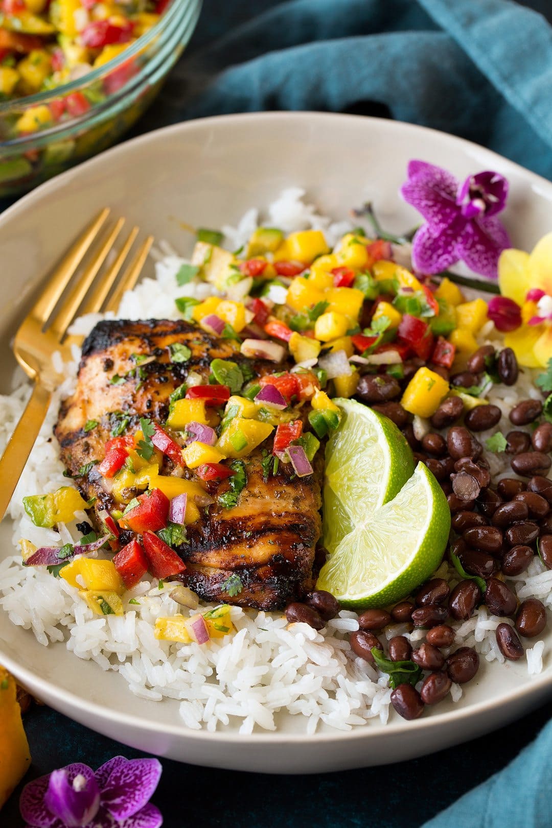 grilled jerk chicken on a bed of rice