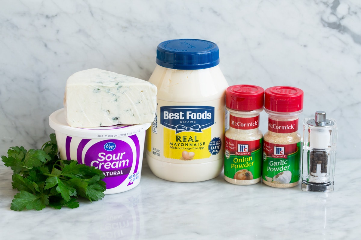 Ingredients shown here that go into blue cheese dip for buffalo wings.