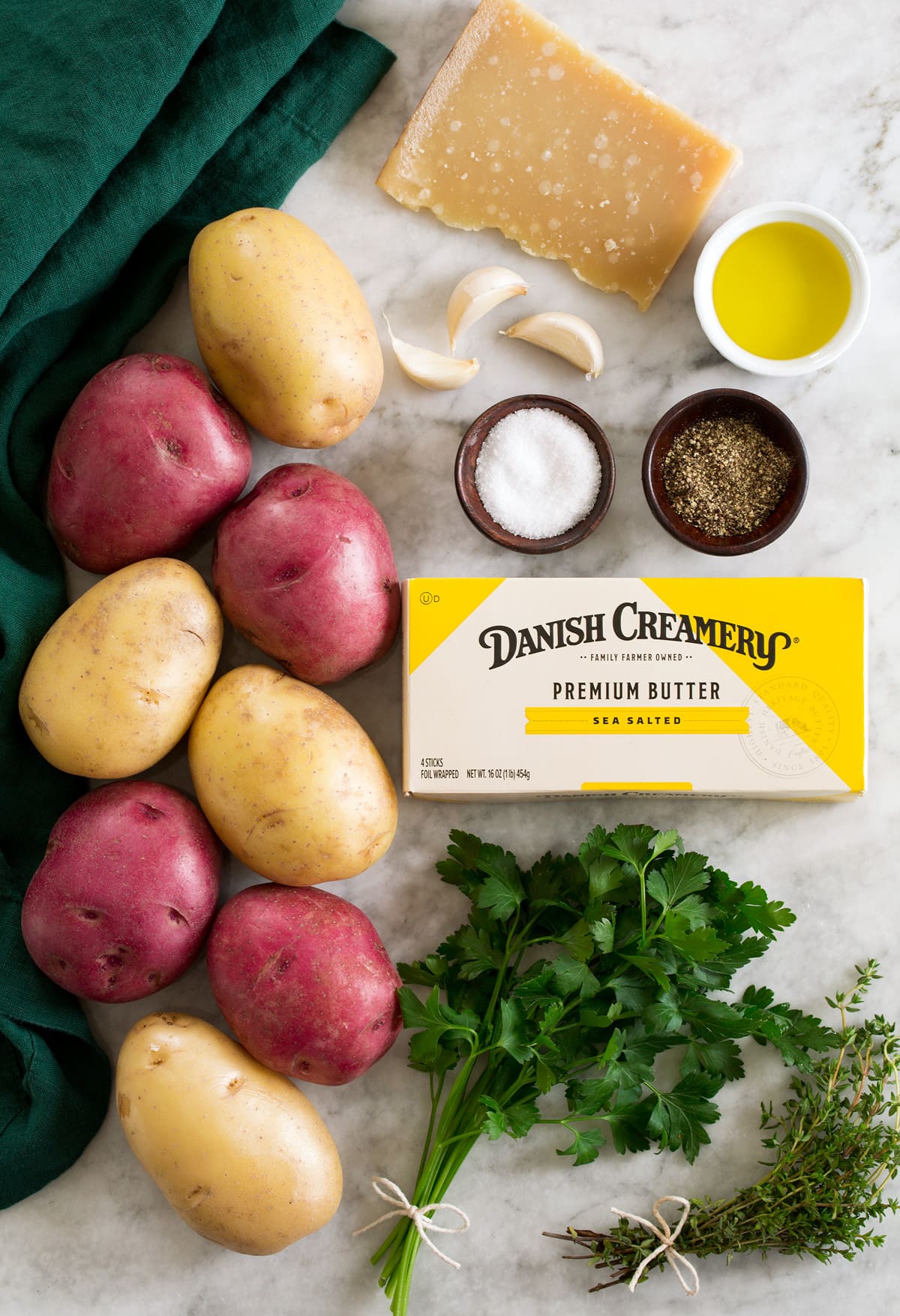 Ingredients shown that are used to make hasselback potatoes.